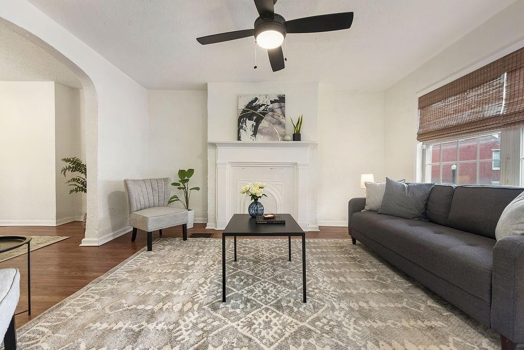 1302 Boyle Street Pittsburgh, PA 15212 - Photo 3 of 50 a living room with furniture and a fireplace
