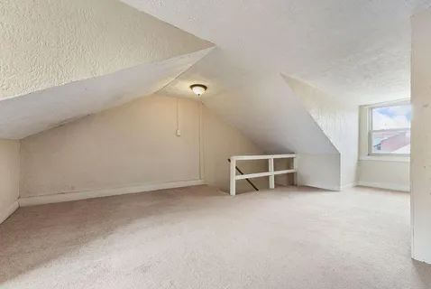 an empty room with a door