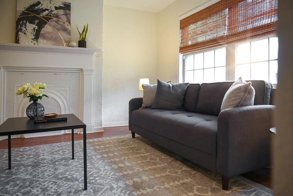1302 Boyle Street Pittsburgh, PA 15212 - Photo 10 of 50 a living room with furniture and window