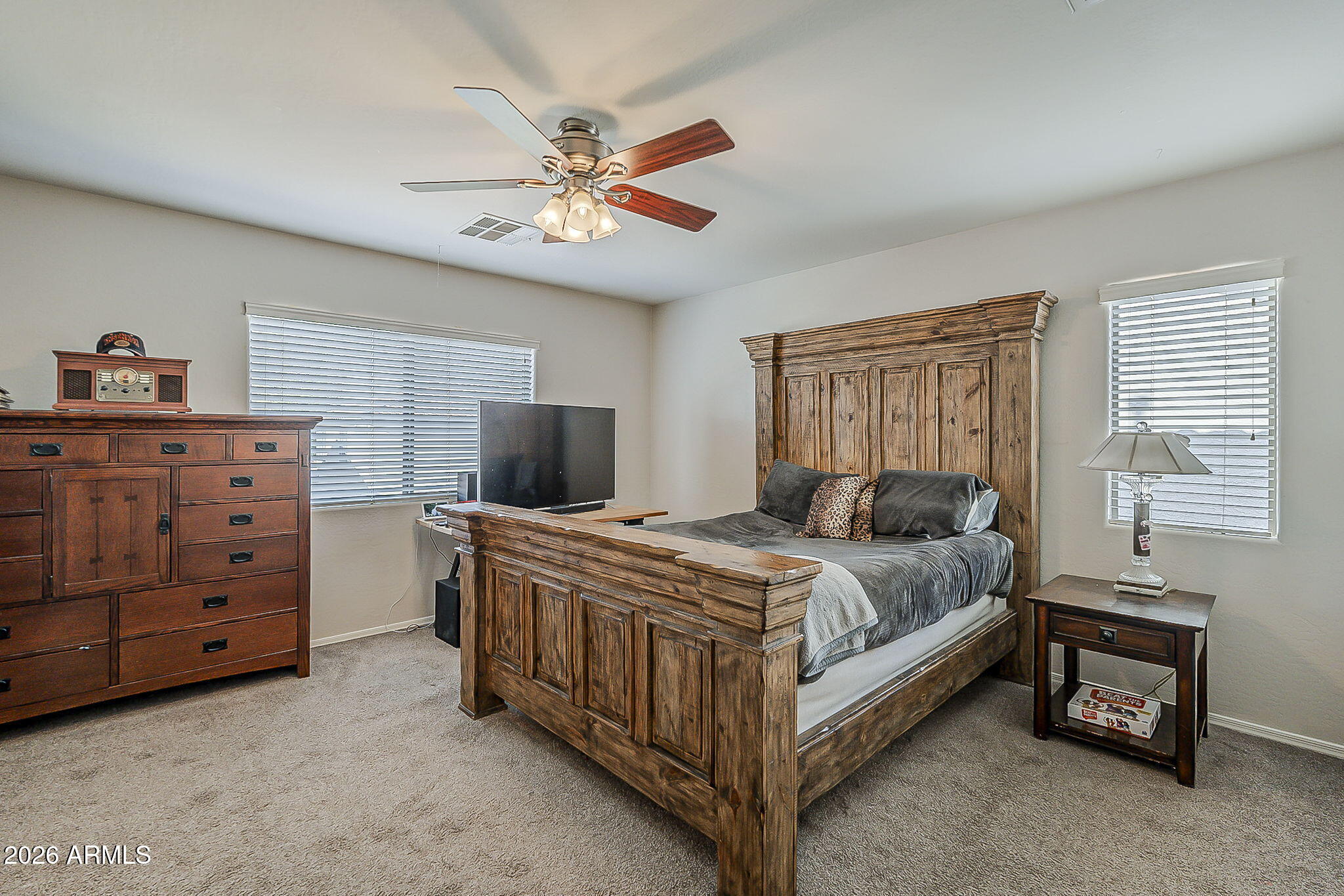 3816 East Phelps Street Gilbert, AZ 85295 - Photo 24 of 47 a bedroom with a bed and a dresser