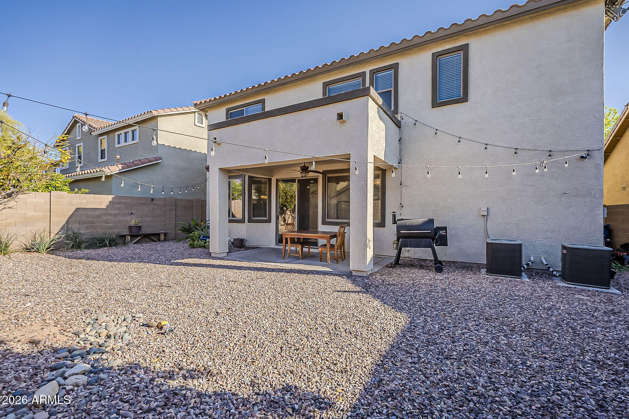3816 East Phelps Street Gilbert, AZ 85295 - Photo 45 of 47 a view of a house with backyard and sitting area