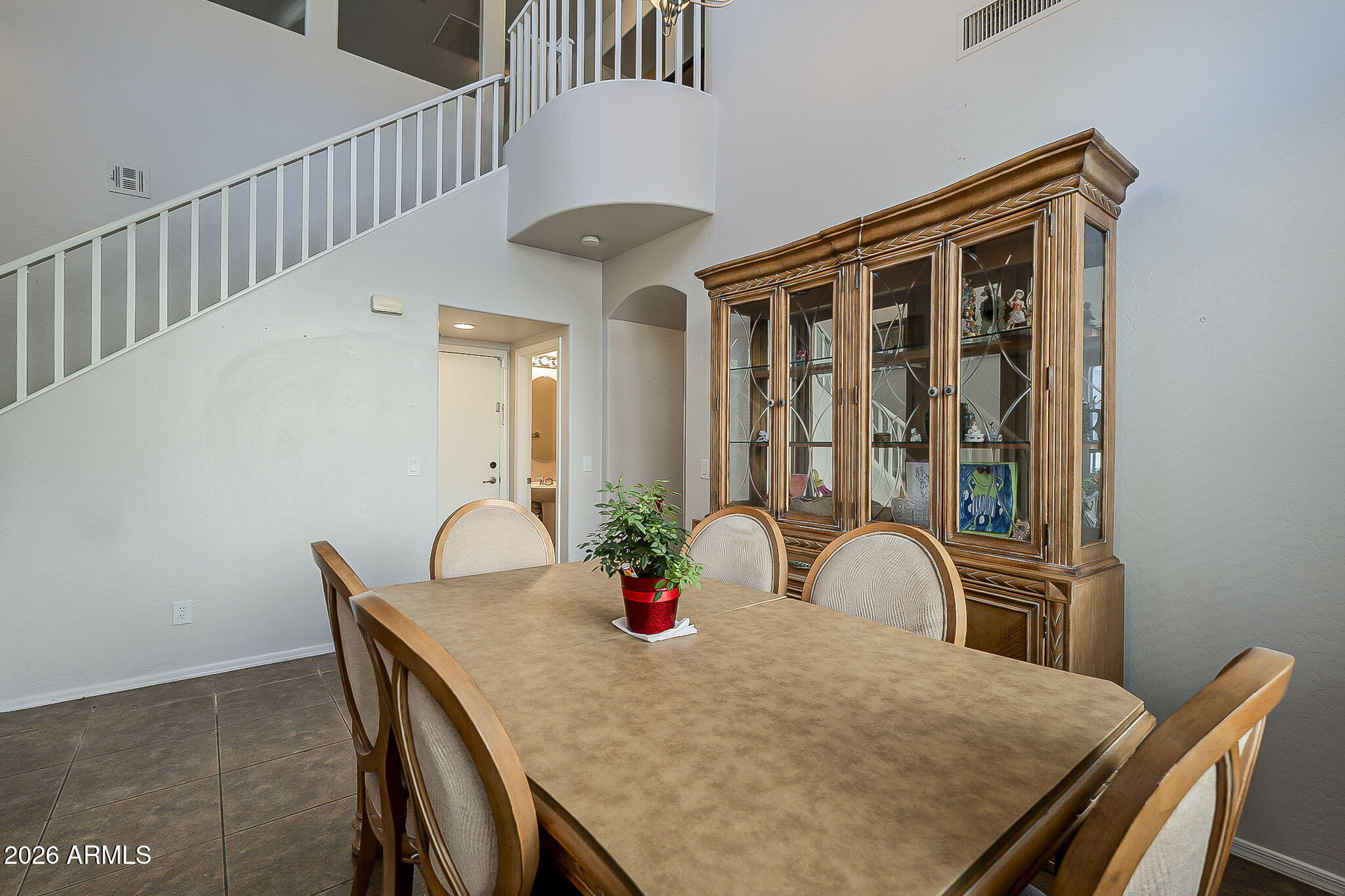 3816 East Phelps Street Gilbert, AZ 85295 - Photo 7 of 47 a dining room with furniture and window