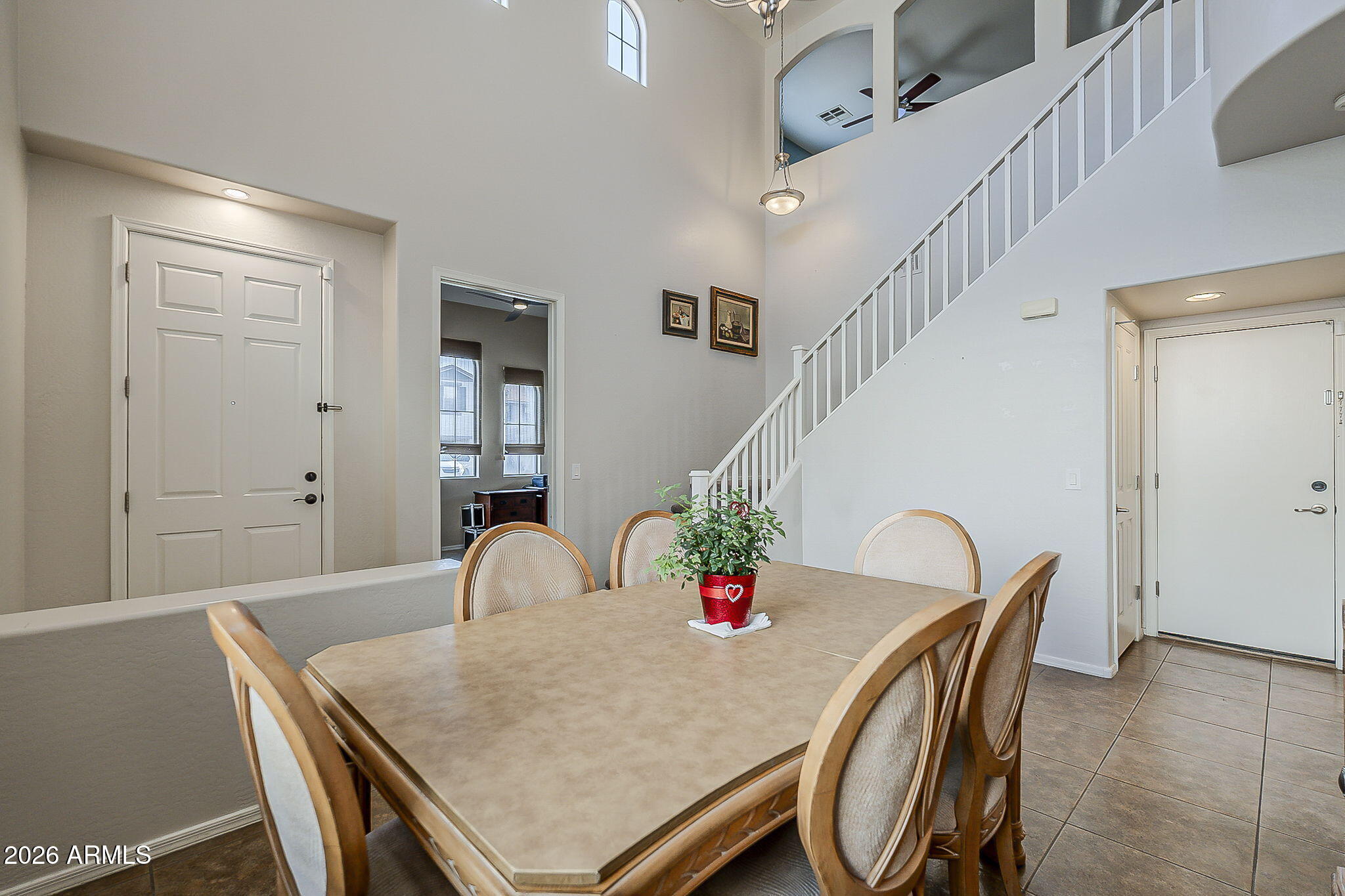 3816 East Phelps Street Gilbert, AZ 85295 - Photo 8 of 47 a dining room with furniture and wooden floor