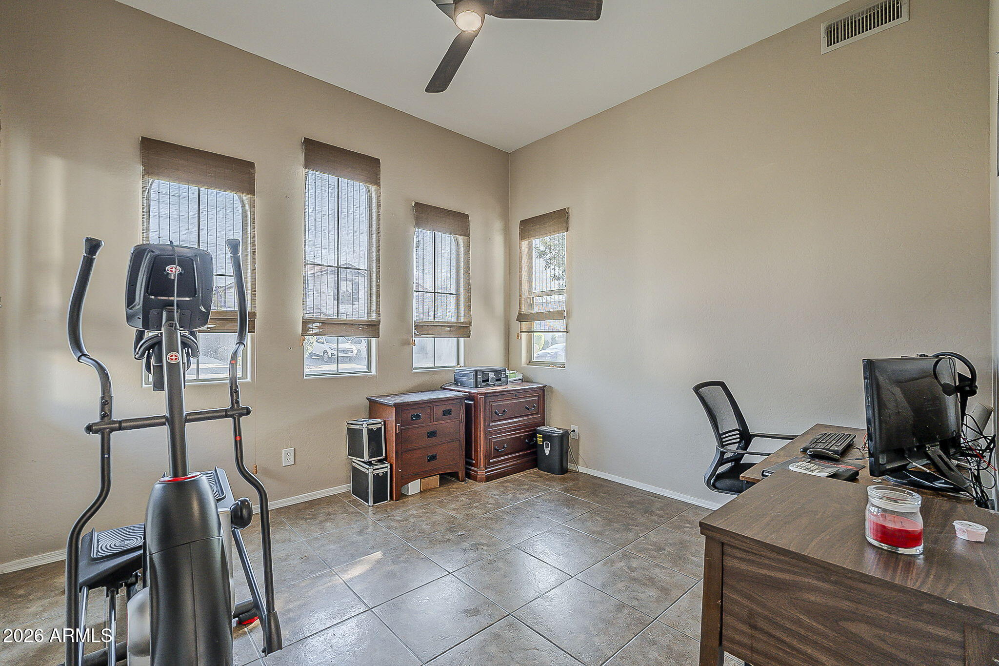 3816 East Phelps Street Gilbert, AZ 85295 - Photo 9 of 47 a room with gym equipment and a window
