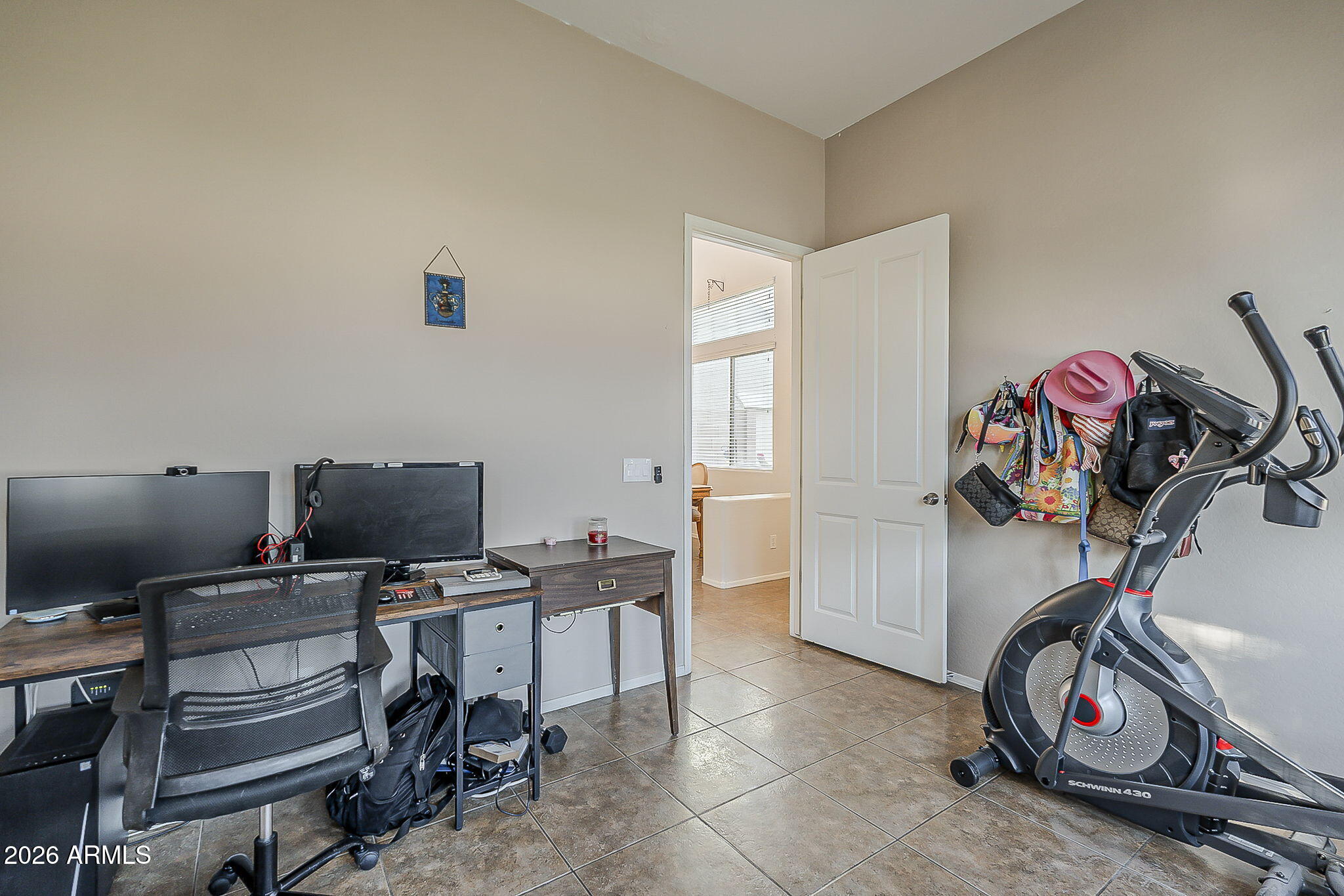 3816 East Phelps Street Gilbert, AZ 85295 - Photo 10 of 47 a view of a workspace with furniture and a window
