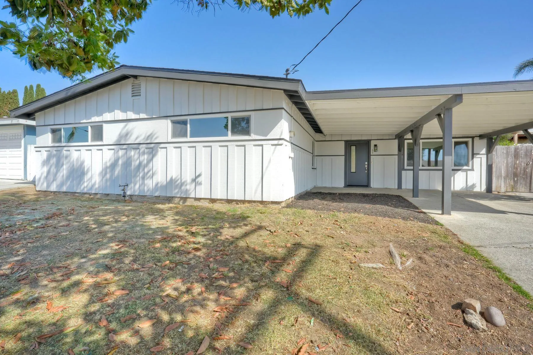 578 East Indian Rock Road Vista, CA 92084 - Photo 7 of 30 a front view of a house with a garden