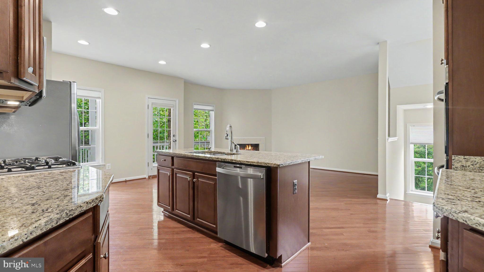 42371 Trellis Square Brambleton, VA 20148 - Photo 23 of 70 Spacious kitchen with modern finishes.