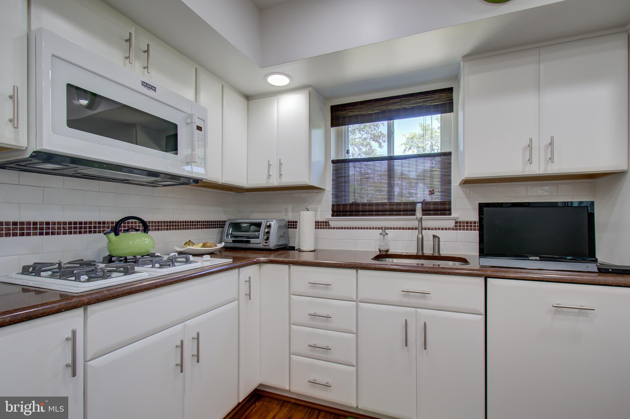 11507 Gilsan Street Silver Spring, MD 20902 - Photo 12 of 35 Updated Kitchen with granite counters