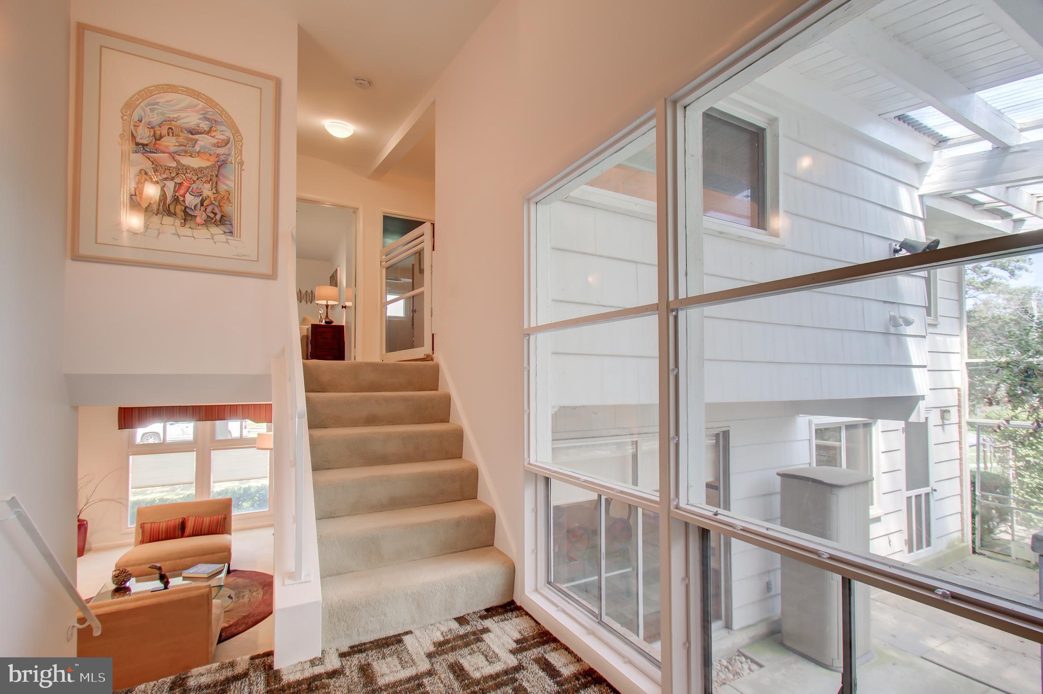 11507 Gilsan Street Silver Spring, MD 20902 - Photo 19 of 35 Enjoy the view of two story patio from family room