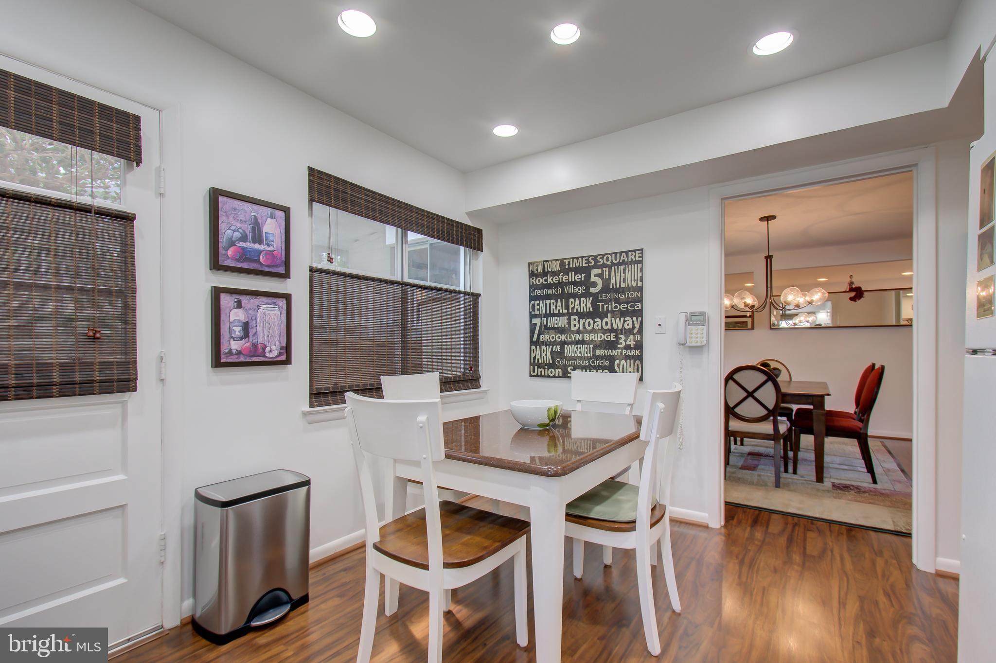 11507 Gilsan Street Silver Spring, MD 20902 - Photo 10 of 35 Custom made granite table conveys