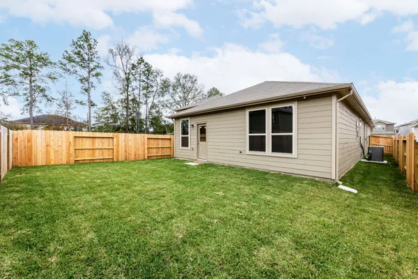a view of a backyard with a garden