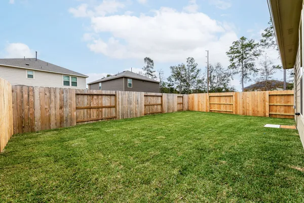 a view of a backyard with a garden