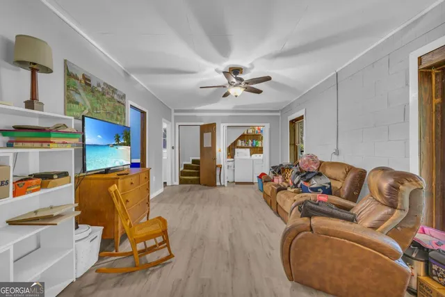 a view of a yard with a tree