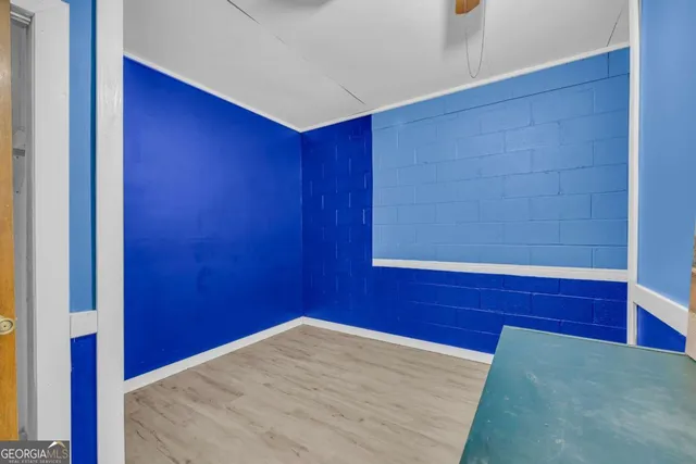 a view of a tree in a yard