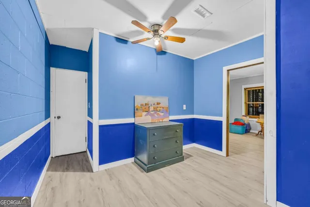 a backyard of a house with lots of green space and lake view