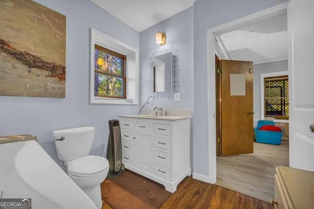 a view of an house with swimming pool and mountains in the background