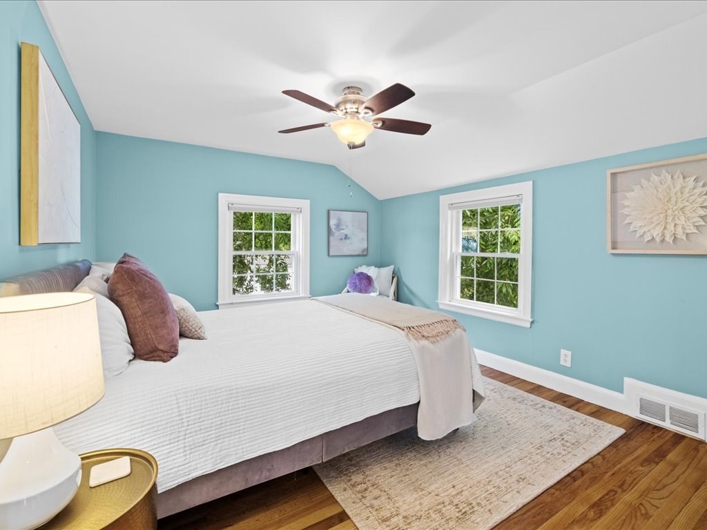 16 Lilly Lane Dedham, MA 02026 - Photo 17 of 27 a bedroom with a large bed and a window