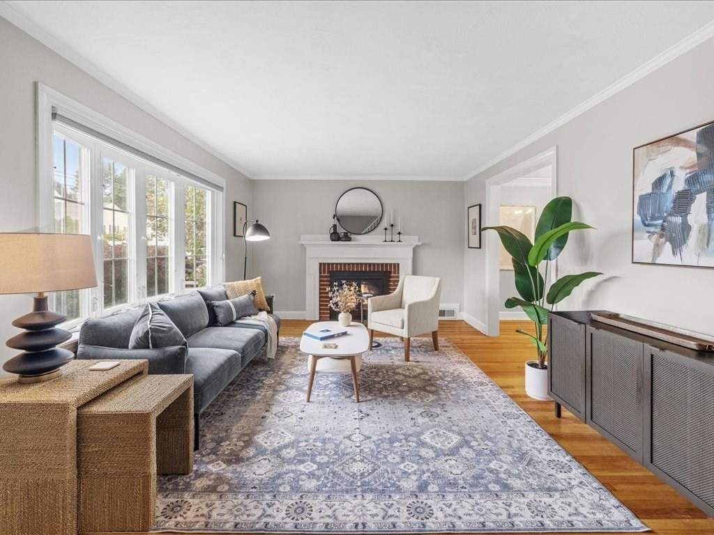 16 Lilly Lane Dedham, MA 02026 - Photo 3 of 27 a living room with furniture fireplace and a large window