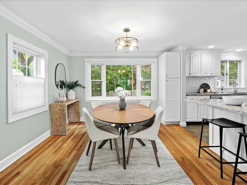 16 Lilly Lane Dedham, MA 02026 - Photo 6 of 27 a view of a dining room with furniture window and outside view