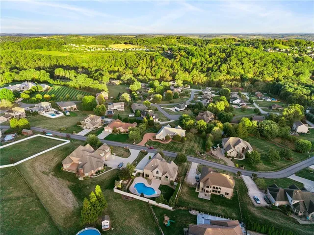 a view of a house with a swimming pool