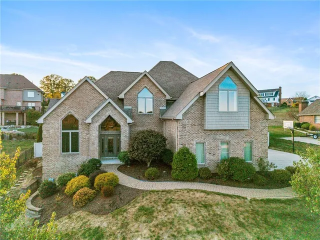 a view of a house with a big yard
