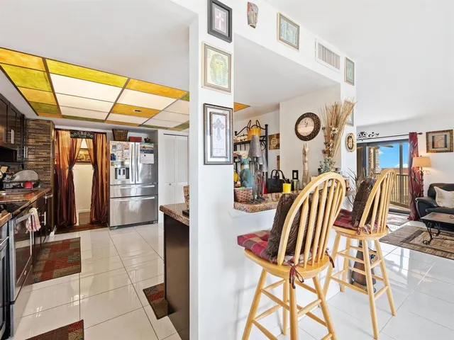 a room with furniture and flat screen tv