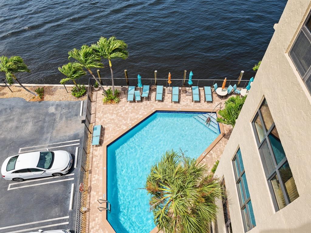 501 North Riverside Drive, Unit 601 Pompano Beach, FL 33062 - Photo 17 of 32 a view of a swimming pool with a patio