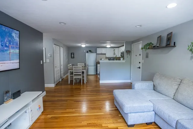 a living room with furniture and a table