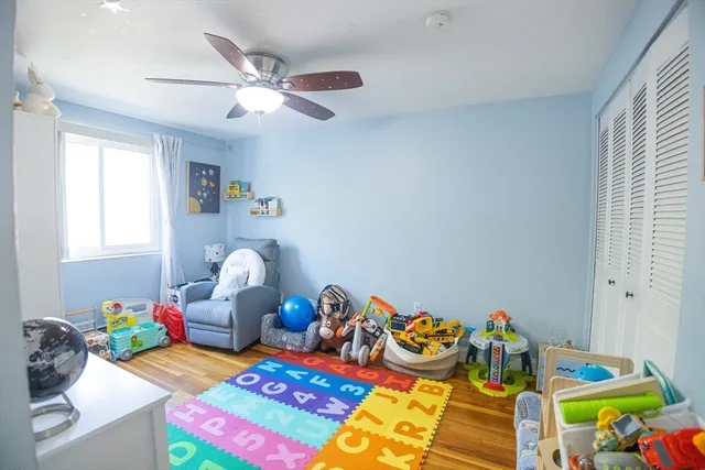 a bed room with a bed and furniture