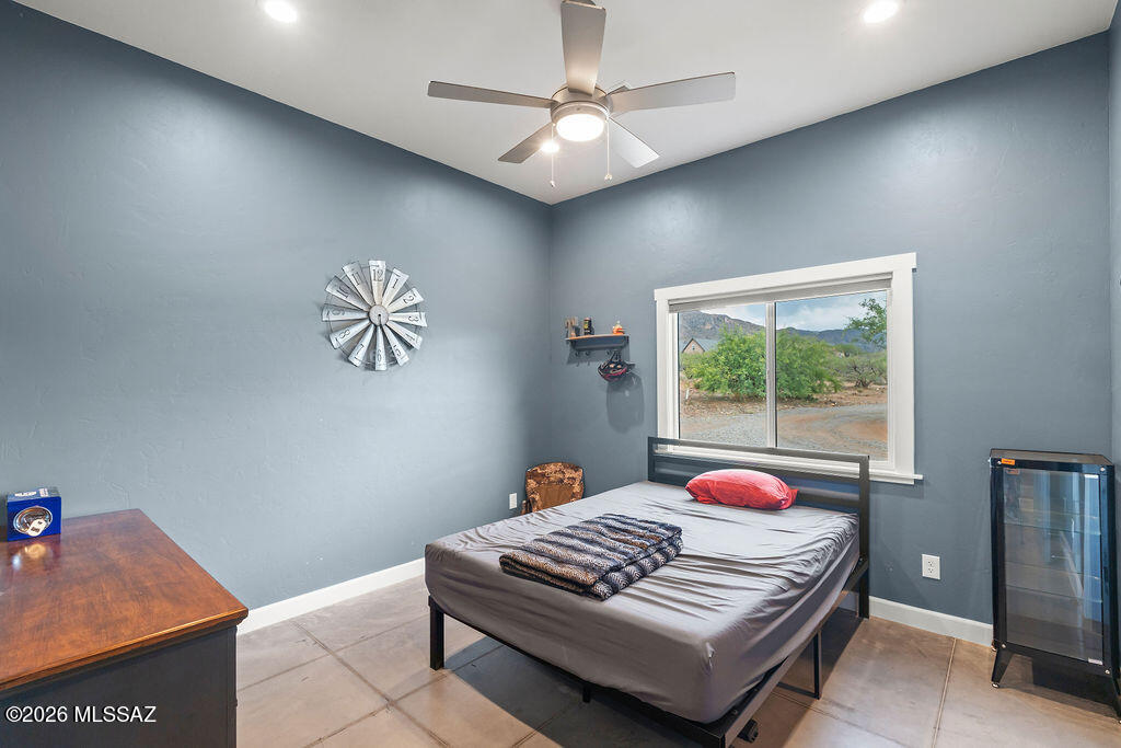 16276 East Empire View Road Vail, AZ 85641 - Photo 28 of 51 a bedroom with a bed and a window