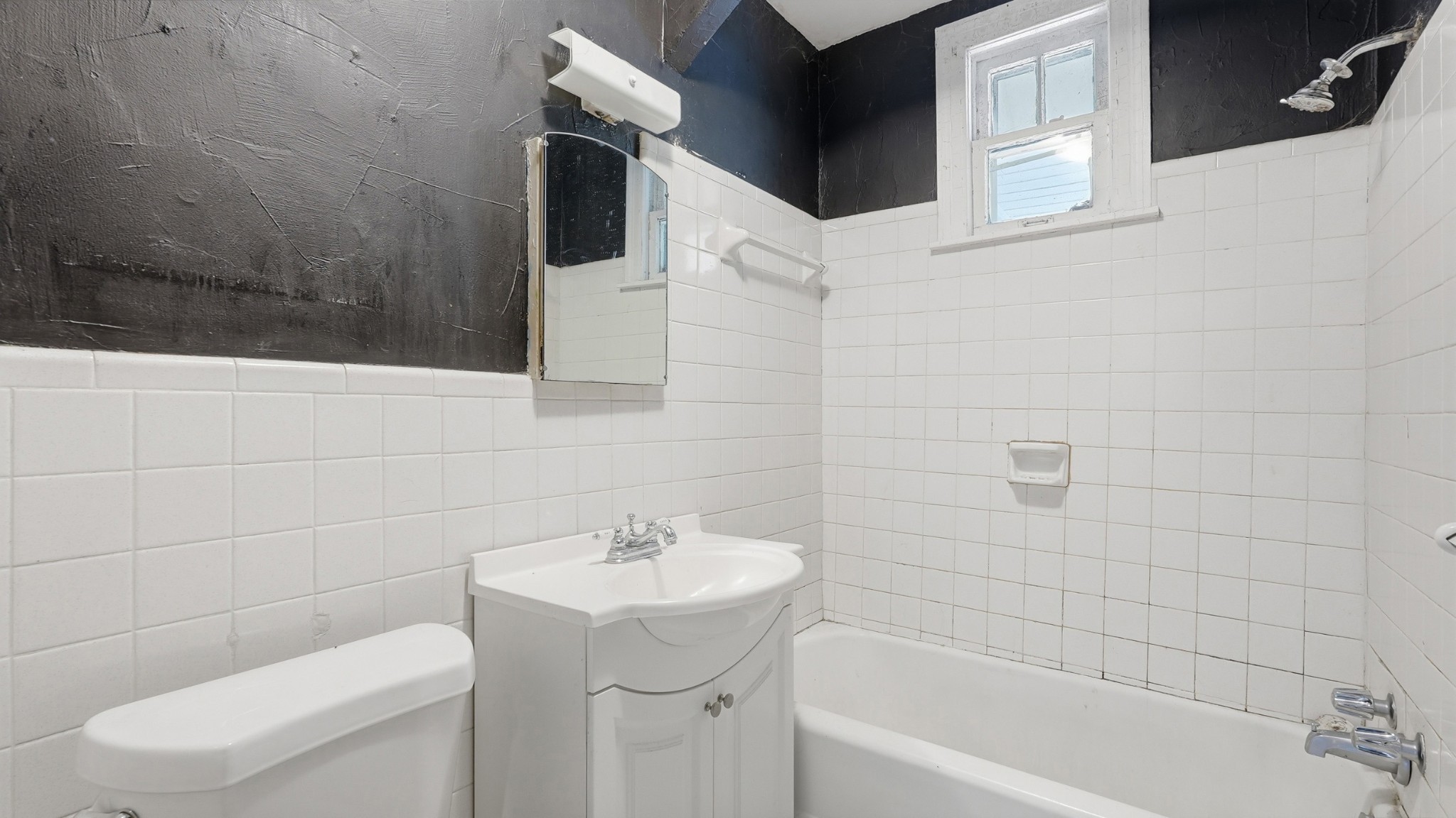 1603 Porter Road Nashville, TN 37206 - Photo 11 of 21 a bathroom with a sink toilet and shower