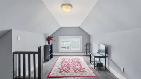 a view of a hallway with windows