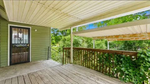a balcony view with outdoor space