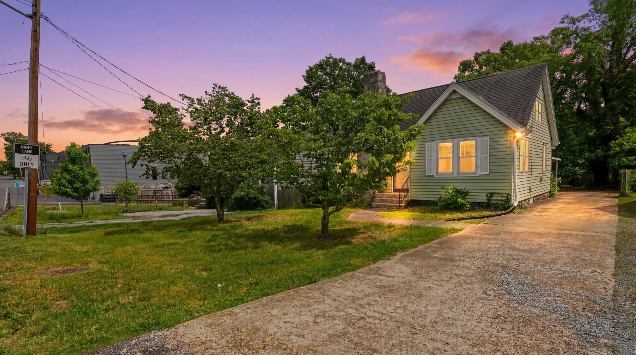 1603 Porter Road Nashville, TN 37206 - Photo 2 of 21 a front view of a house with a yard