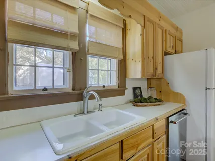 a bathroom with a sink and a large mirror
