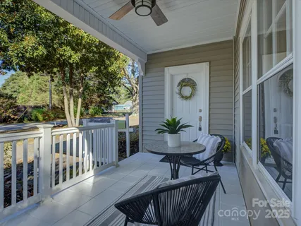 a view of a porch with furniture