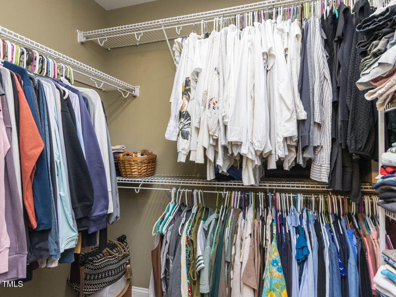 1201 Kalworth Road Wake Forest, NC 27587 - Photo 30 of 76 a view of walk in closet with clothes and shoes
