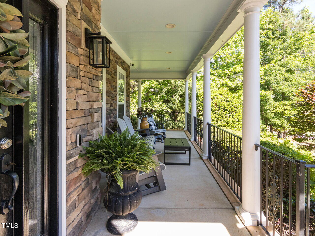 1201 Kalworth Road Wake Forest, NC 27587 - Photo 4 of 76 a view of a porch with plants