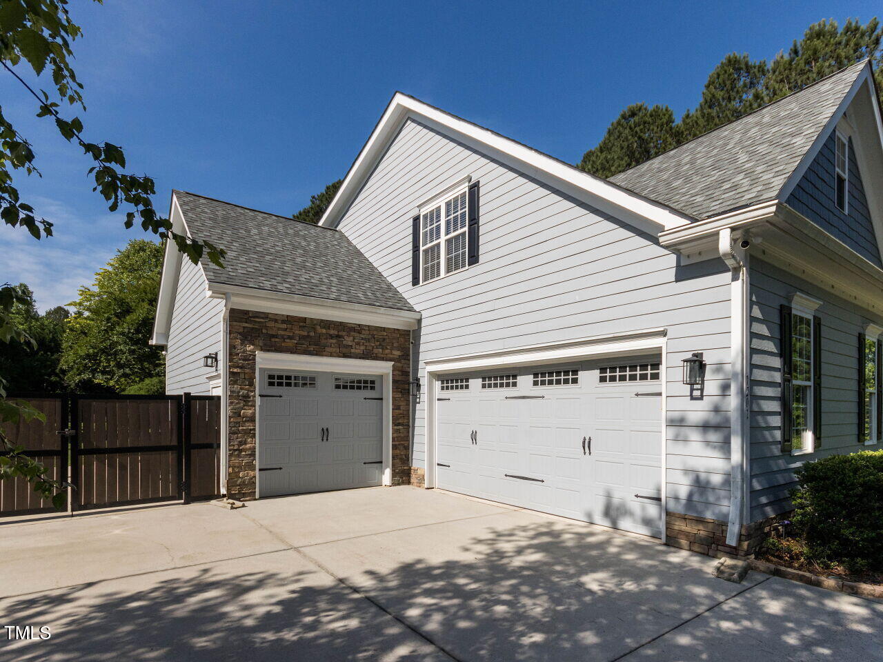 1201 Kalworth Road Wake Forest, NC 27587 - Photo 57 of 76 a front view of a house with a garage