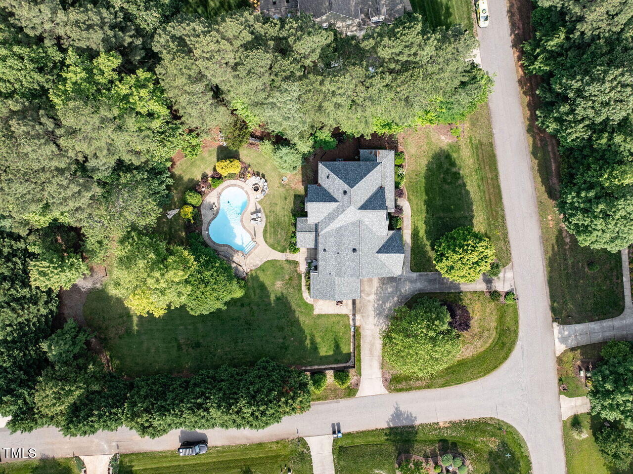1201 Kalworth Road Wake Forest, NC 27587 - Photo 64 of 76 an aerial view of a house with a yard and garden