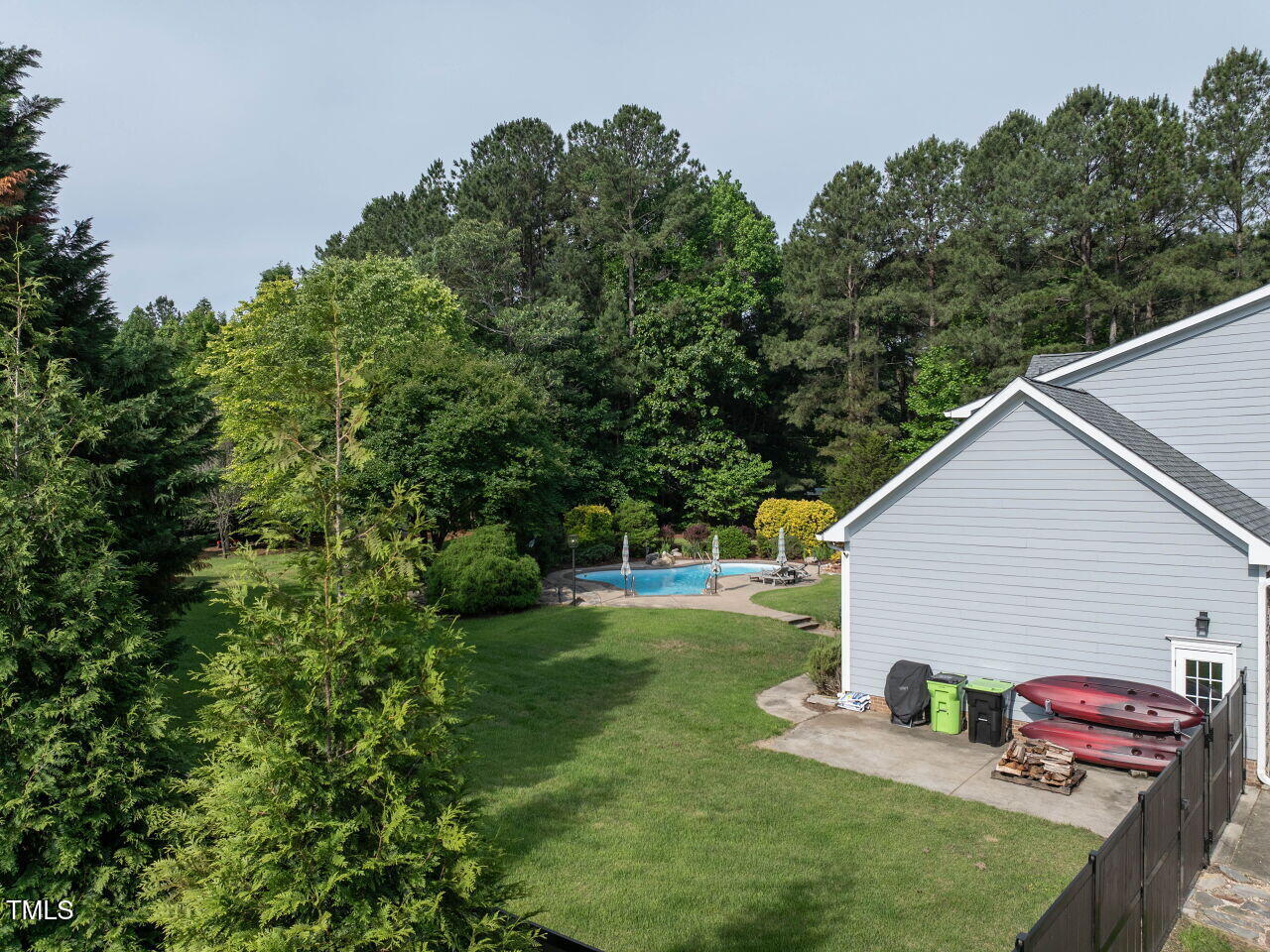 1201 Kalworth Road Wake Forest, NC 27587 - Photo 70 of 76 a view of a back yard of the house