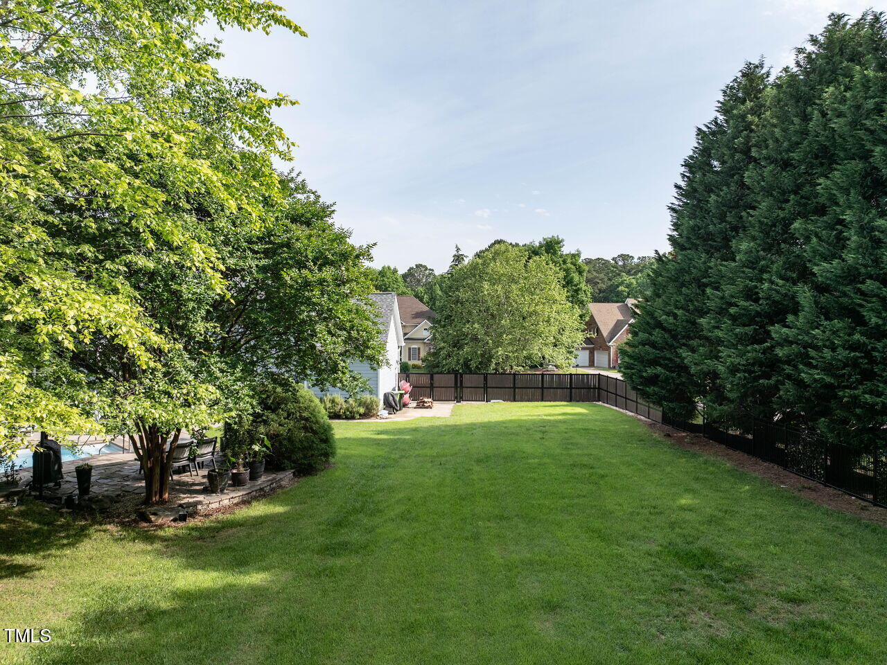 1201 Kalworth Road Wake Forest, NC 27587 - Photo 72 of 76 a view of a backyard with a garden