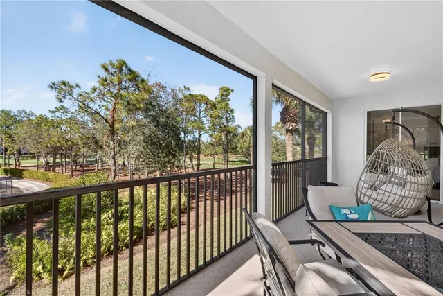 a view of a porch with furniture
