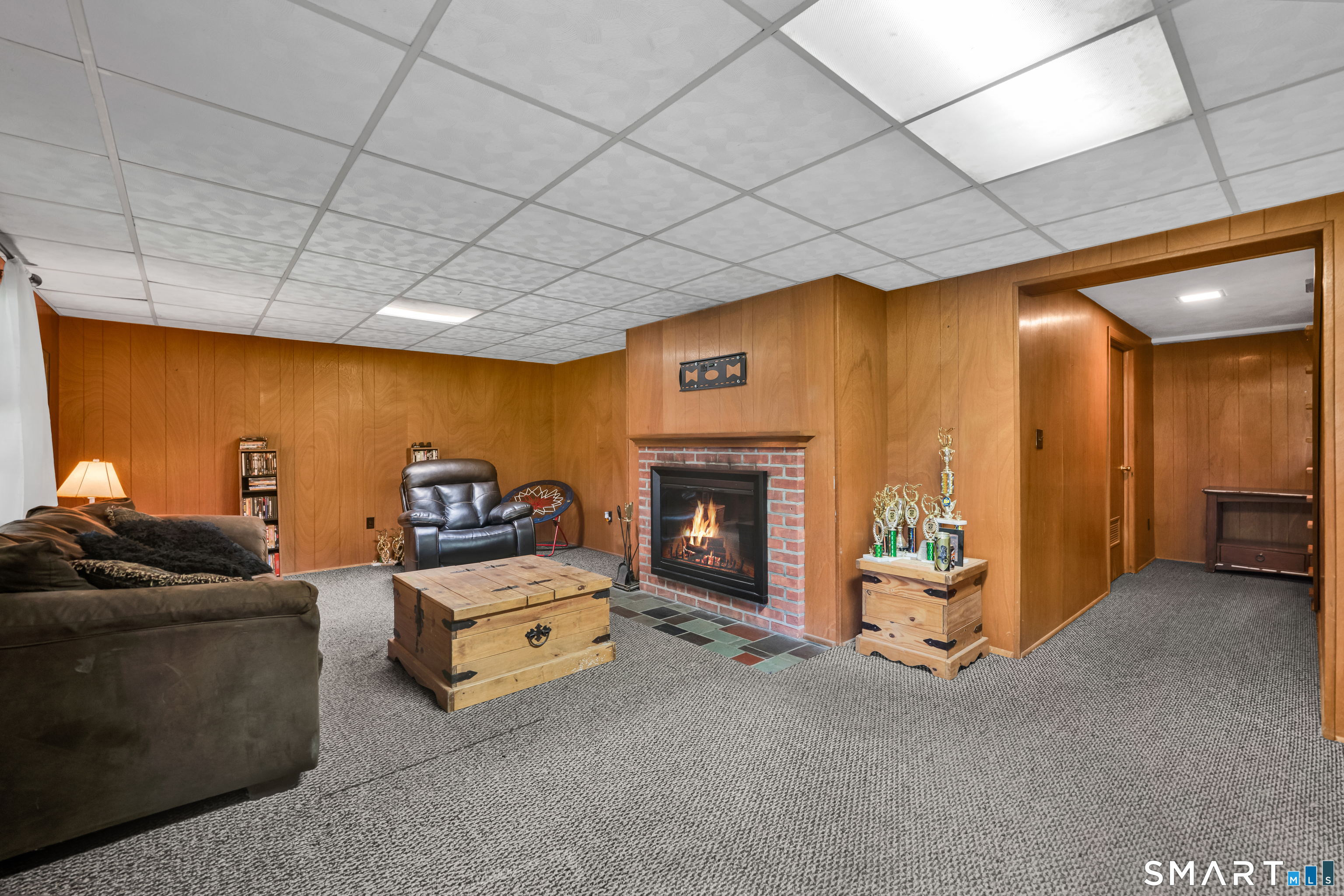 85 Timothy Road Naugatuck, CT 06770 - Photo 22 of 30 a living room with furniture and a fireplace