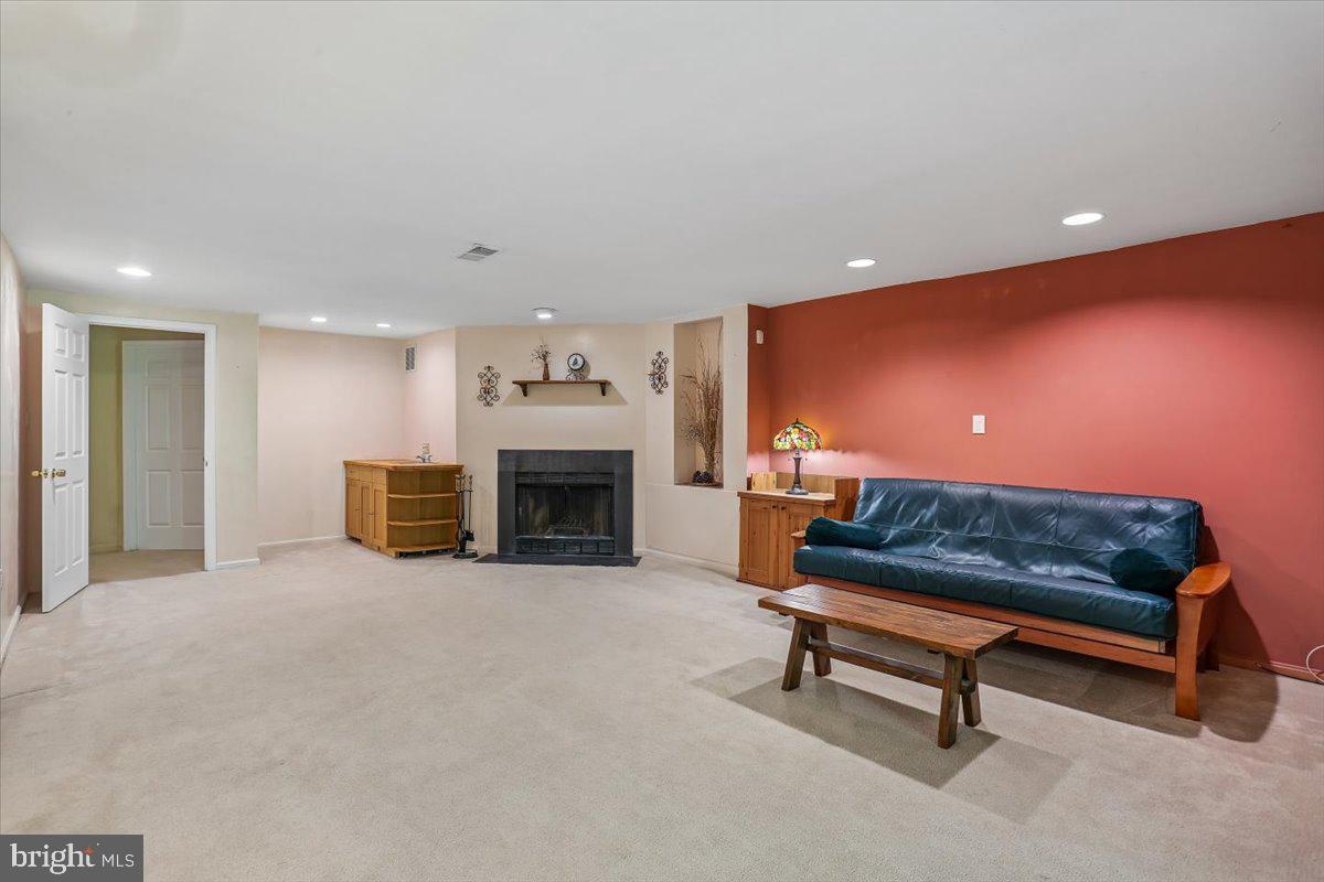 2459 McCormick Road Rockville, MD 20850 - Photo 35 of 54 Spacious Lower Level Family Room with Fireplace