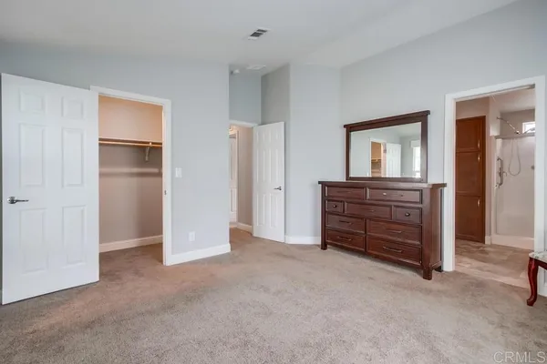 a view of room with closet and cabinet