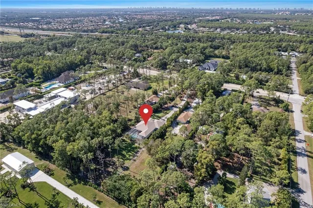 an aerial view of a town with couple of houses