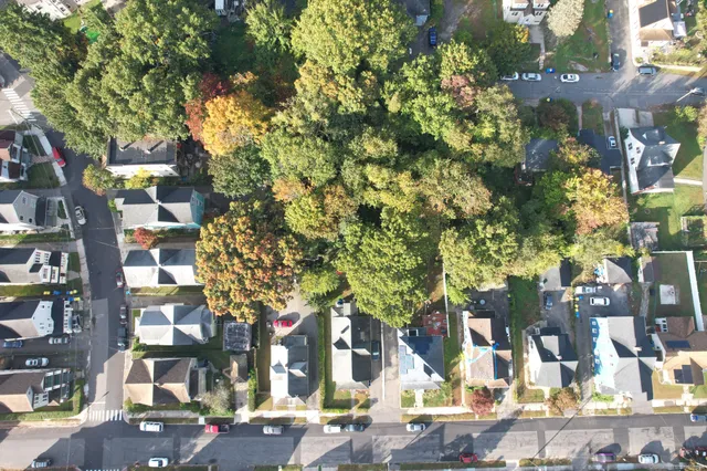 an aerial view of a city with lots of residential buildings