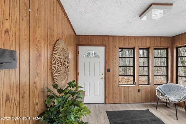 a kitchen with a sink stove and microwave