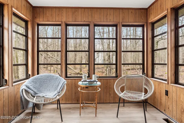 a view of a refrigerator in kitchen and wooden floor